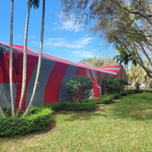 A residential house tented for termite fumigation by PowerX Pest Control of South Florida in Miami, FL.