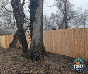 A long section of a new residential wood fence installed by Kodiak Fence Co. in Flower Mound, TX.