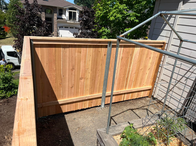 A residential wood fence installation completed by RL Quality construction in Gaston, OR.