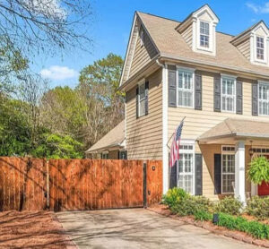A newly installed residential wooden driveway gate by Georgia Entry Solutions in Atlanta, GA.