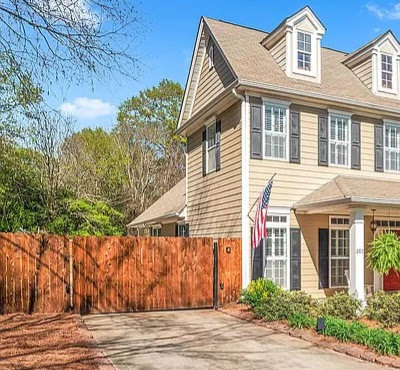 A newly installed residential wooden driveway gate by Georgia Entry Solutions in Atlanta, GA.