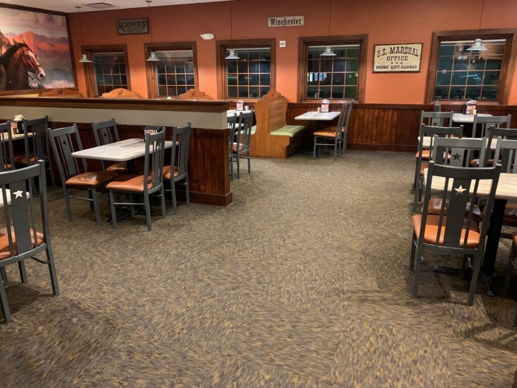 A newly carpeted dining area in a restaurant by Innovative Installations LLC in Rapid City, SD.