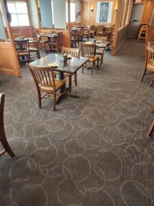 Patterned commercial carpet installed in a restaurant dining area by Carpet Center in Wilmington, NC.