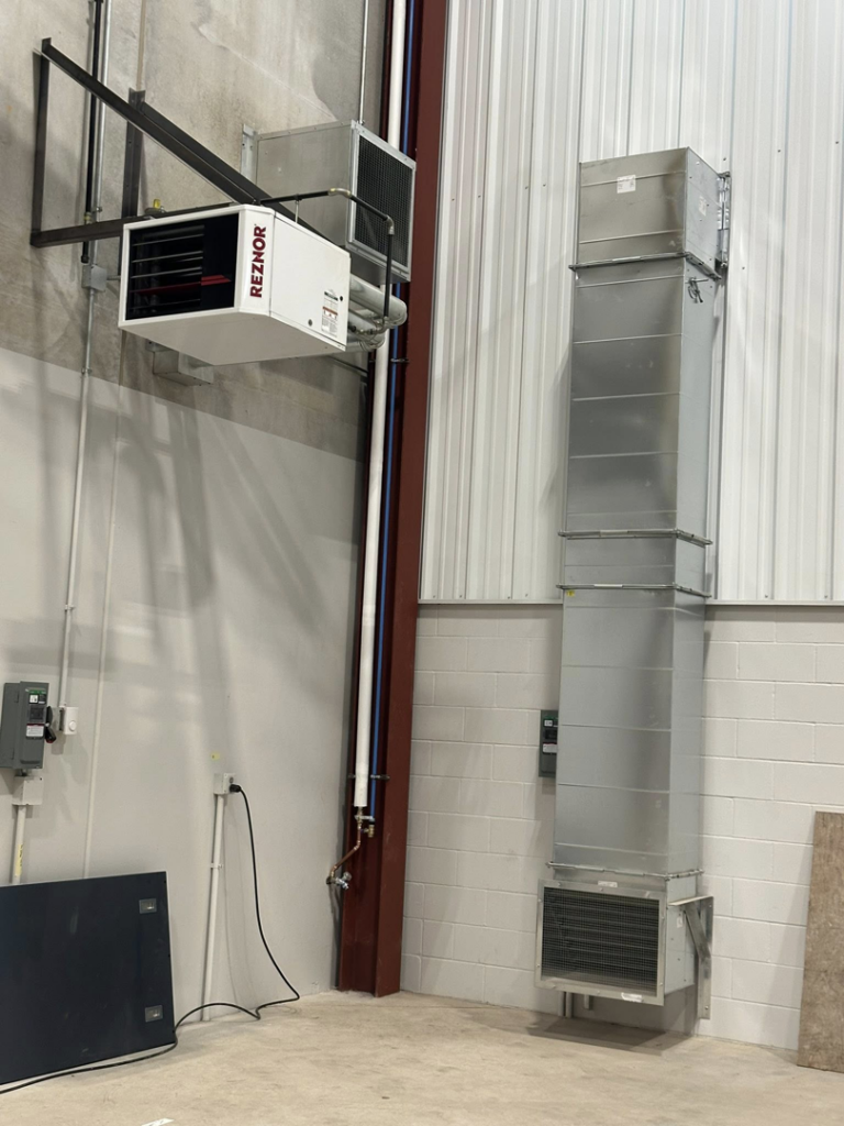 Reznor unit heater and vertical ductwork installation by Sheet Metal Solutions, LLC in Duluth, MN.