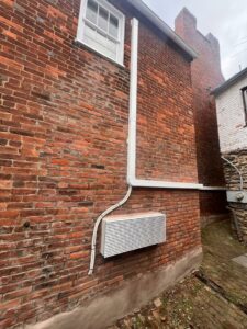 A Rheem furnace and air handler unit installed in a utility room by Trusted HVAC in Martinsburg, WV
