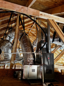 A Rheem furnace and extensive ductwork installed in an attic by Diversified Services NA in Rogers, AR.