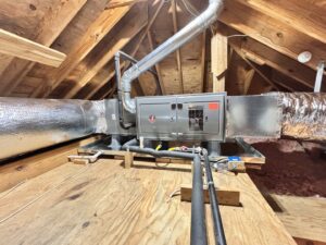 Rheem HVAC air handler and ductwork installed in an attic by ACE Heating & Cooling, Inc. in Jonesboro, AR