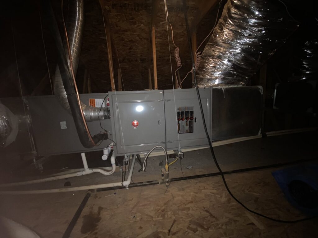 A Rheem HVAC system installed in an attic by Kings of AC, LLC in Queen Creek, AZ.