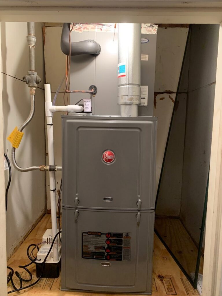 A Rheem indoor furnace and air handler unit installed by Johnson's A/C & Heating in Alexandria, LA.