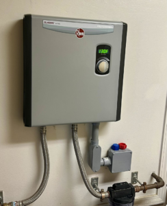 A newly installed Rheem tankless water heater by Pacifico Heating and Cooling in Shadyside, OH.