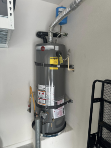 A Rheem water heater with a blue expansion tank, expertly installed by CaliFam Services for a client in Las Vegas, NV.