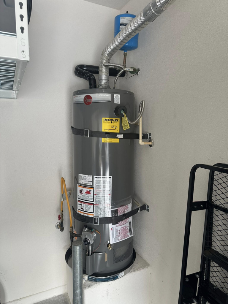 A Rheem water heater with a blue expansion tank, expertly installed by CaliFam Services for a client in Las Vegas, NV.