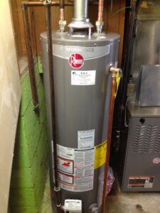 A newly installed Rheem water heater and furnace in a utility room by D &Sons Heating and Cooling LLC in Schenectady, NY