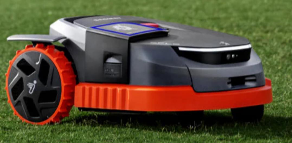 A modern robotic lawn mower efficiently cutting grass for Fontana Lawn and Garden in Monroe, LA.