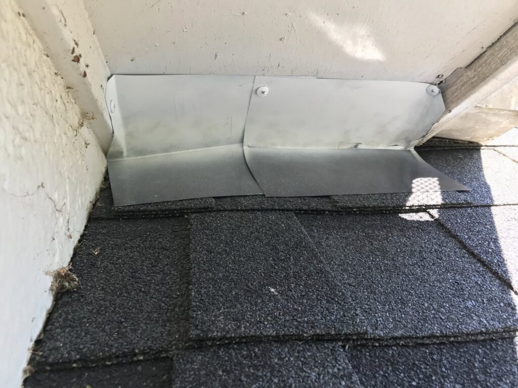 New metal flashing installed on a roofline for wildlife exclusion by The Squirrel Guys in Birmingham, AL.