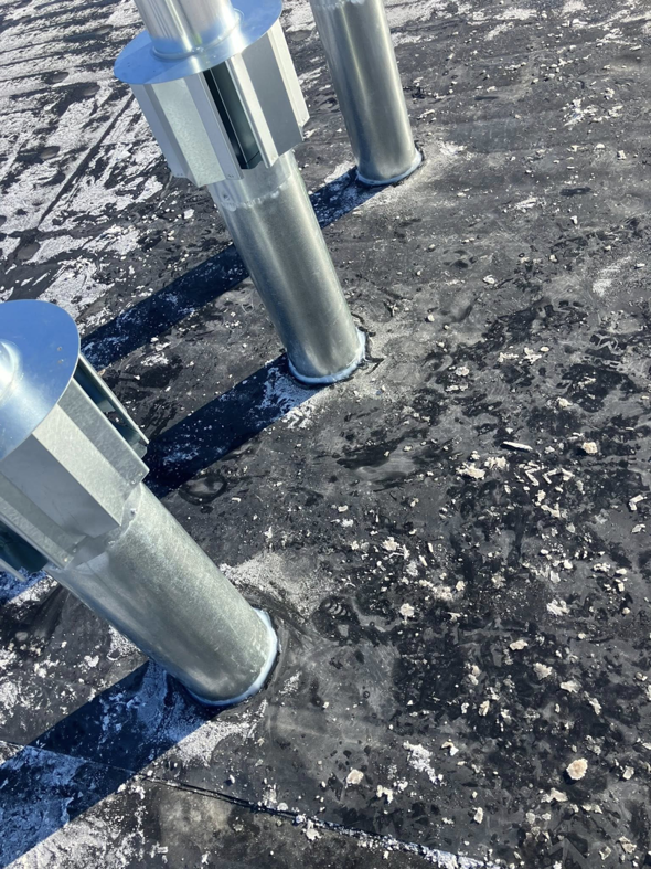 Roof penetrations for a ventilation system installed by Sheet Metal Solutions, LLC in Duluth, MN.