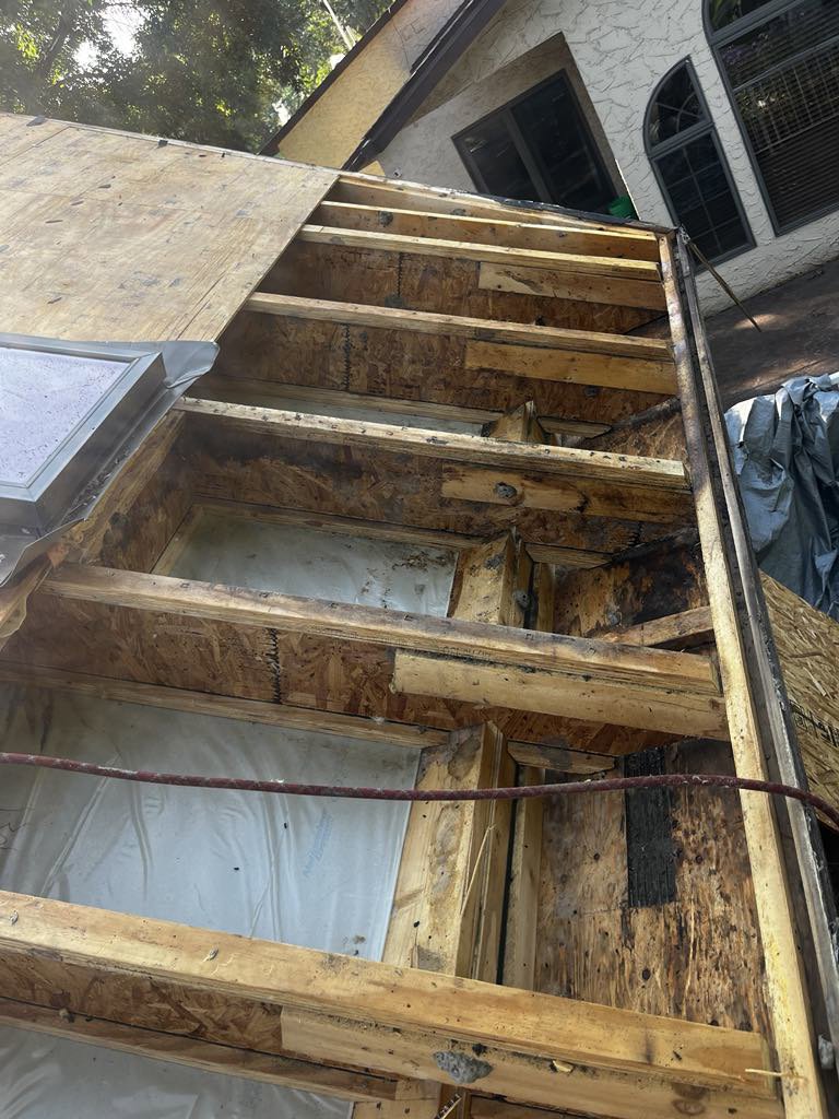 Exposed roof structure showing damage, indicating repairs or exclusion work by Stellar Wildlife Solutions in Cottage Grove, MN.