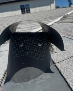 A roof vent secured with a wire mesh screen for wildlife exclusion by Ark Pest Management in Anaheim, CA.