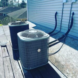 Two rooftop AC units installed by Caballero's A/C & Heating in Marrero, LA.