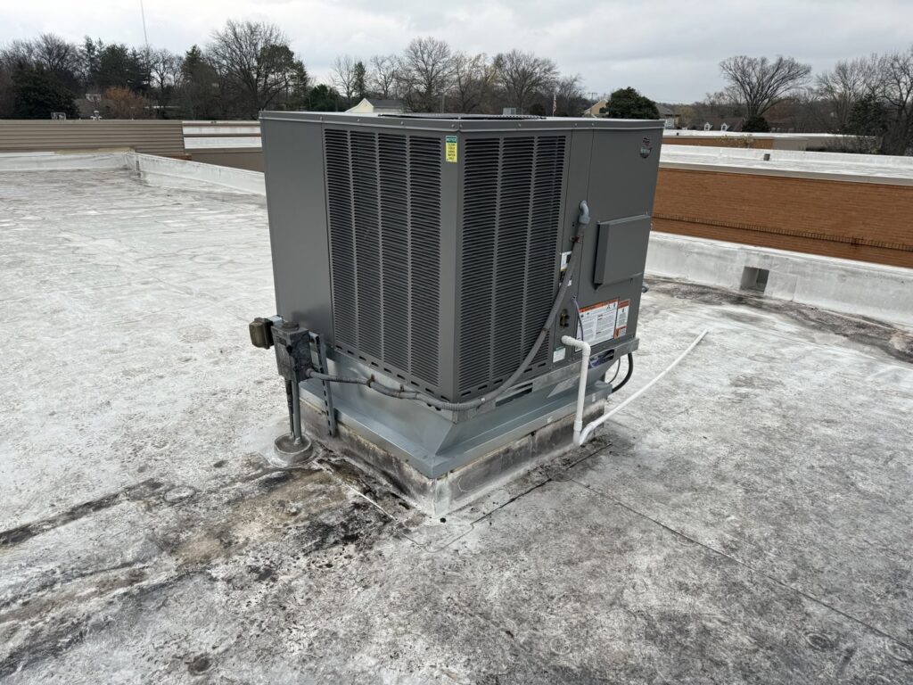 A large commercial HVAC unit installed on a rooftop by Elite Home Comfort in Clarksville, TN