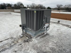 A large commercial HVAC unit installed on a rooftop by Elite Home Comfort in Clarksville, TN