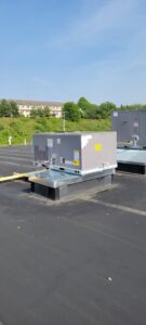 A rooftop commercial HVAC unit installed or serviced by JJJ Techs Heating and Cooling in Kinzers, PA.