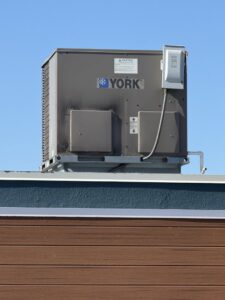 A rooftop commercial HVAC unit by York, showcasing installation and maintenance services from HVAC Philly in Feasterville, PA.