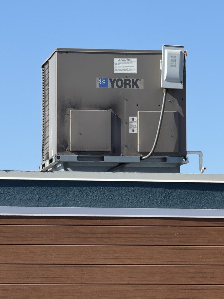 A rooftop commercial HVAC unit by York, showcasing installation and maintenance services from HVAC Philly in Feasterville, PA.