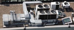 Multiple commercial rooftop HVAC units, representing the installation and service work of Applied Mechanical Solutions in Hazelwood, MO.
