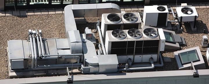 Multiple commercial rooftop HVAC units, representing the installation and service work of Applied Mechanical Solutions in Hazelwood, MO.
