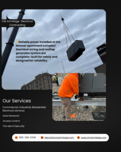 A worker overseeing a rooftop generator installation at the Neisner apartment complex by CM Armitage Electrical Contracting Inc in Rochester, NY.