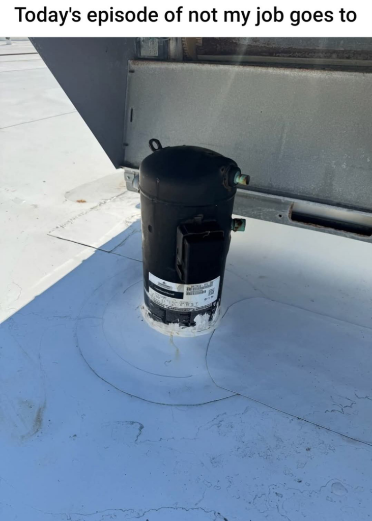 A rooftop HVAC compressor unit on a commercial building, serviced by Hvaclife in Minneapolis, MN.