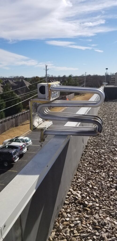 A rooftop HVAC condenser coil component serviced by A1 Mechanical Heating and Cooling Services in Waynesville, OH.