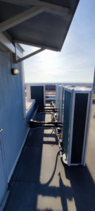 Rooftop installation of multiple outdoor HVAC condenser units by Κυριακιδης Στεφανος ''Team Gas'' in Évosmo, Greece