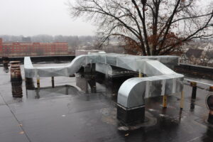 Rooftop HVAC ductwork installation for a commercial building by Ash Plumbing, Drain & Sewer in Akron, OH.