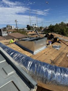 HVAC ductwork being installed on a rooftop by Kaluas HVAC Mechanical Services in Phoenix, AZ