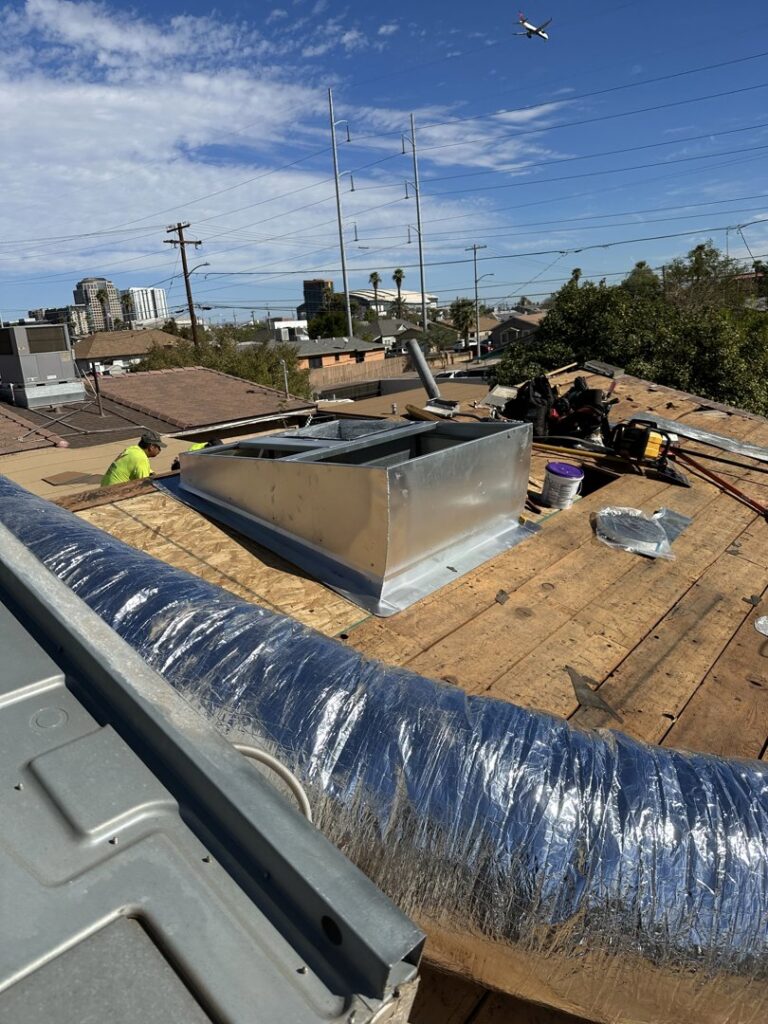 HVAC ductwork being installed on a rooftop by Kaluas HVAC Mechanical Services in Phoenix, AZ