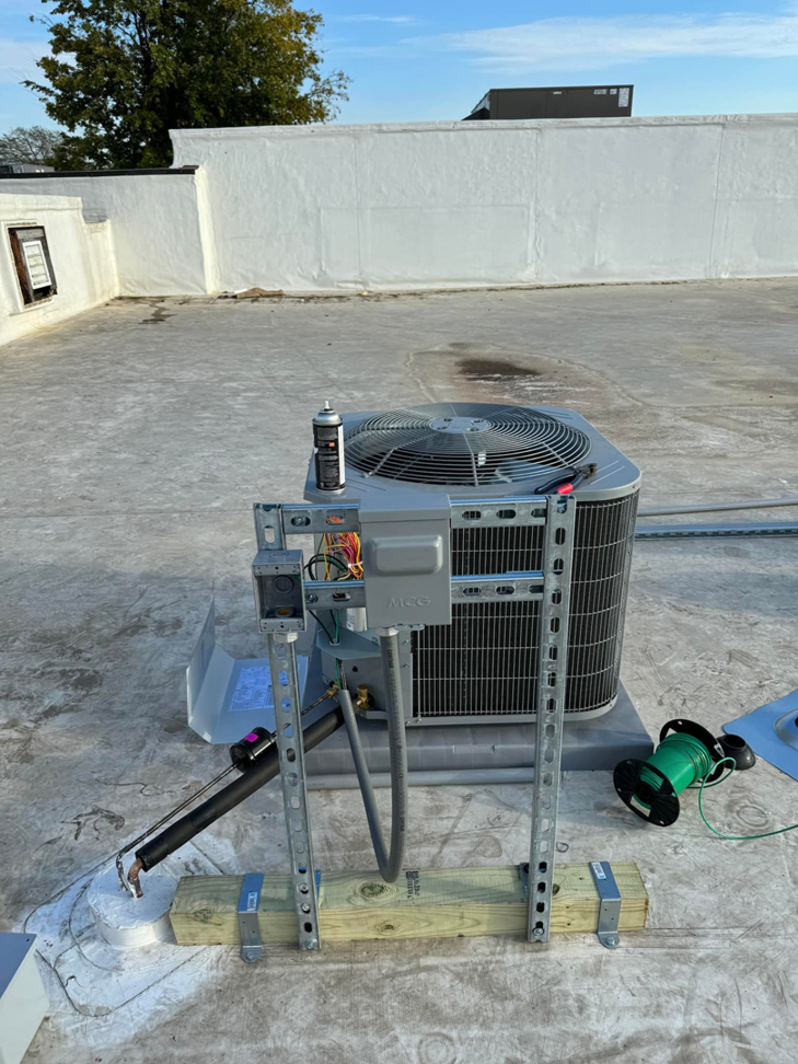 Rooftop HVAC electrical setup with conduit and control boxes installed by Redmond Electric LLC in Horn Lake, MS.