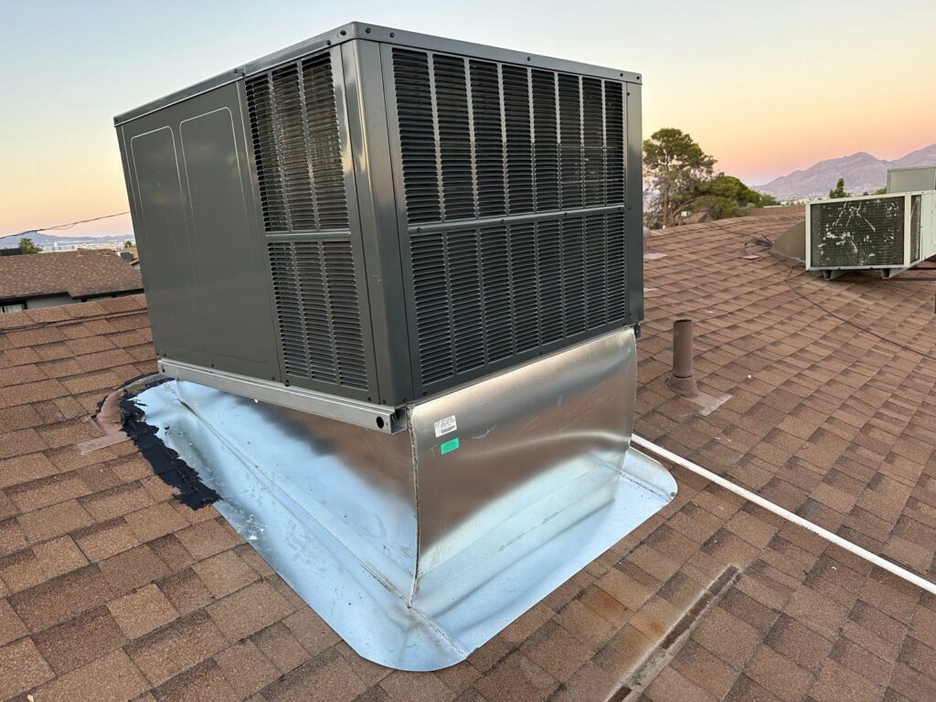 A new rooftop HVAC package unit installed on a residential roof by Honest AC Experts in Las Vegas, NV