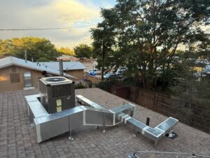 Rooftop HVAC unit and extensive ductwork installation by After Hours Heating & Air Conditioning LLC in Chesapeake, VA.