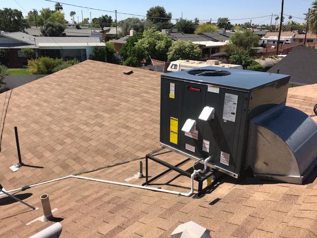 A large rooftop HVAC unit installed on a commercial building by All Metro Air Conditioning in Apache Junction, AZ.