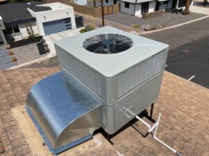 A newly installed rooftop HVAC unit on a residential home by AZ Perfect Comfort in Phoenix, AZ.