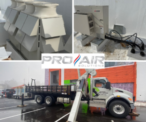 Rooftop HVAC units and a crane truck for installation by Pro Air Solutions, an HVAC contractor in Cleveland, OH