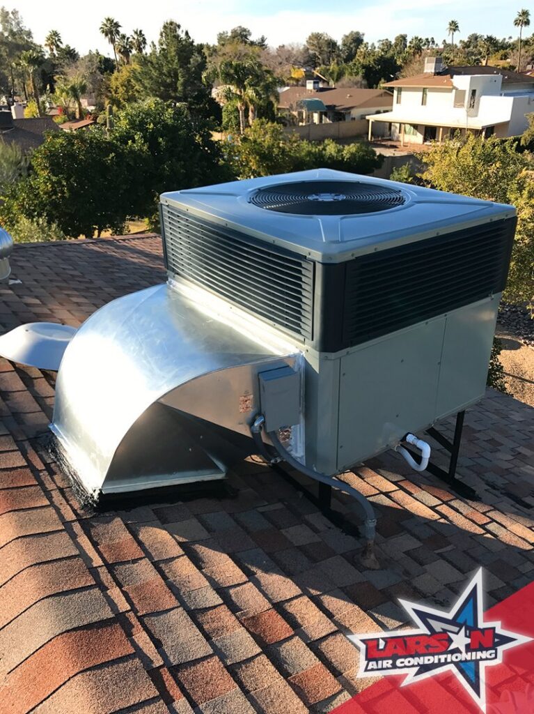 A newly installed rooftop HVAC unit with ductwork by Larson Air Conditioning in Scottsdale, AZ