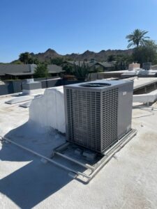 A newly installed rooftop HVAC unit for cooling and heating services by Master Mechanical in Gilbert, AZ