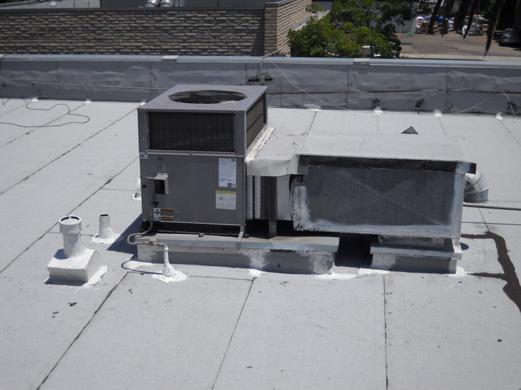 A large commercial rooftop HVAC unit installed, serviced by Trenary Service Company in Martinsburg, WV.