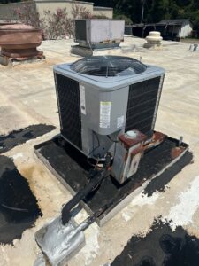 A newly installed rooftop HVAC unit by Zippers Heating and Cooling in Mobile, AL.