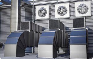 Rooftop commercial HVAC units and extensive ductwork, representing services by Accurate Air Inc. in Manchester, NH.