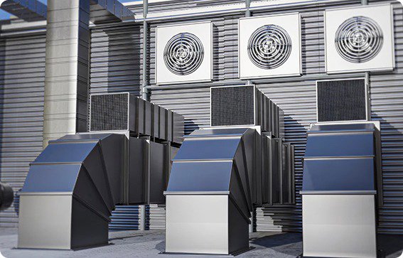 Rooftop commercial HVAC units and extensive ductwork, representing services by Accurate Air Inc. in Manchester, NH.