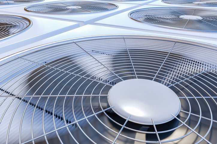 Multiple rooftop HVAC units for commercial heating and cooling services by Reed's Heating & Cooling in Toms River, NJ.